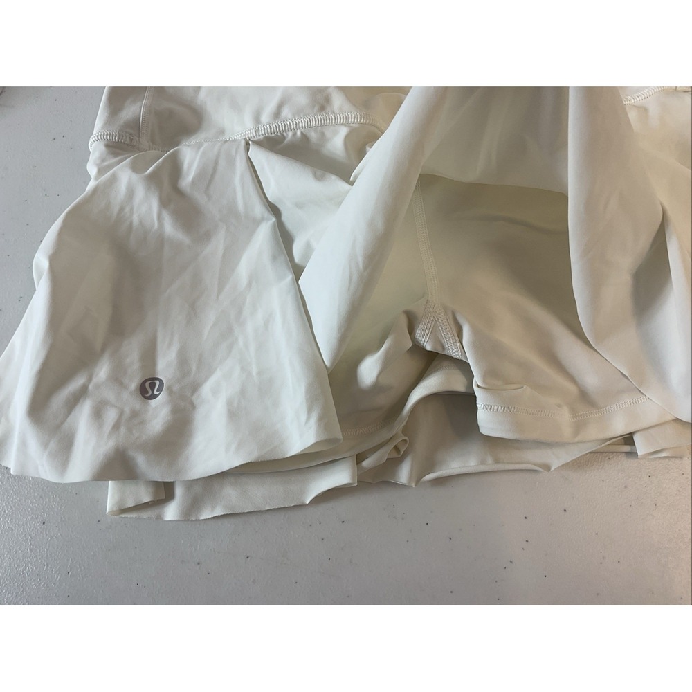 lululemon size 8  T LOT  4 Pieces, white skort, maroon hotty hot, tanks - Picture 4 of 16